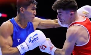 Muydinkhujaev outboxes McKeever in an opening bout for Uzbekistan national team 